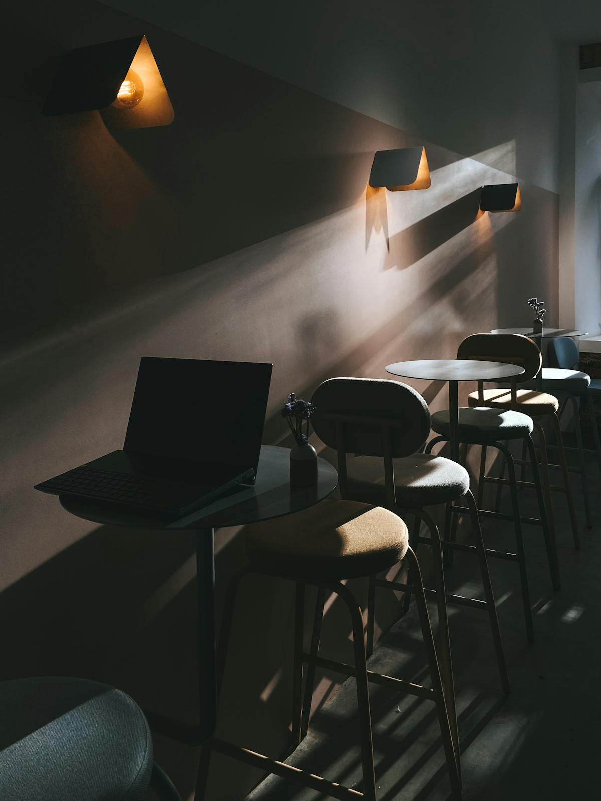 Laptop on a calm cafe table used for research